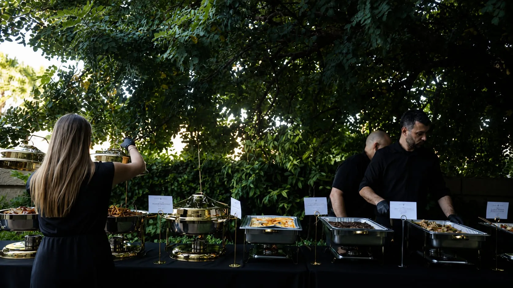 The ASOFE team setting up an outdoor catering station
